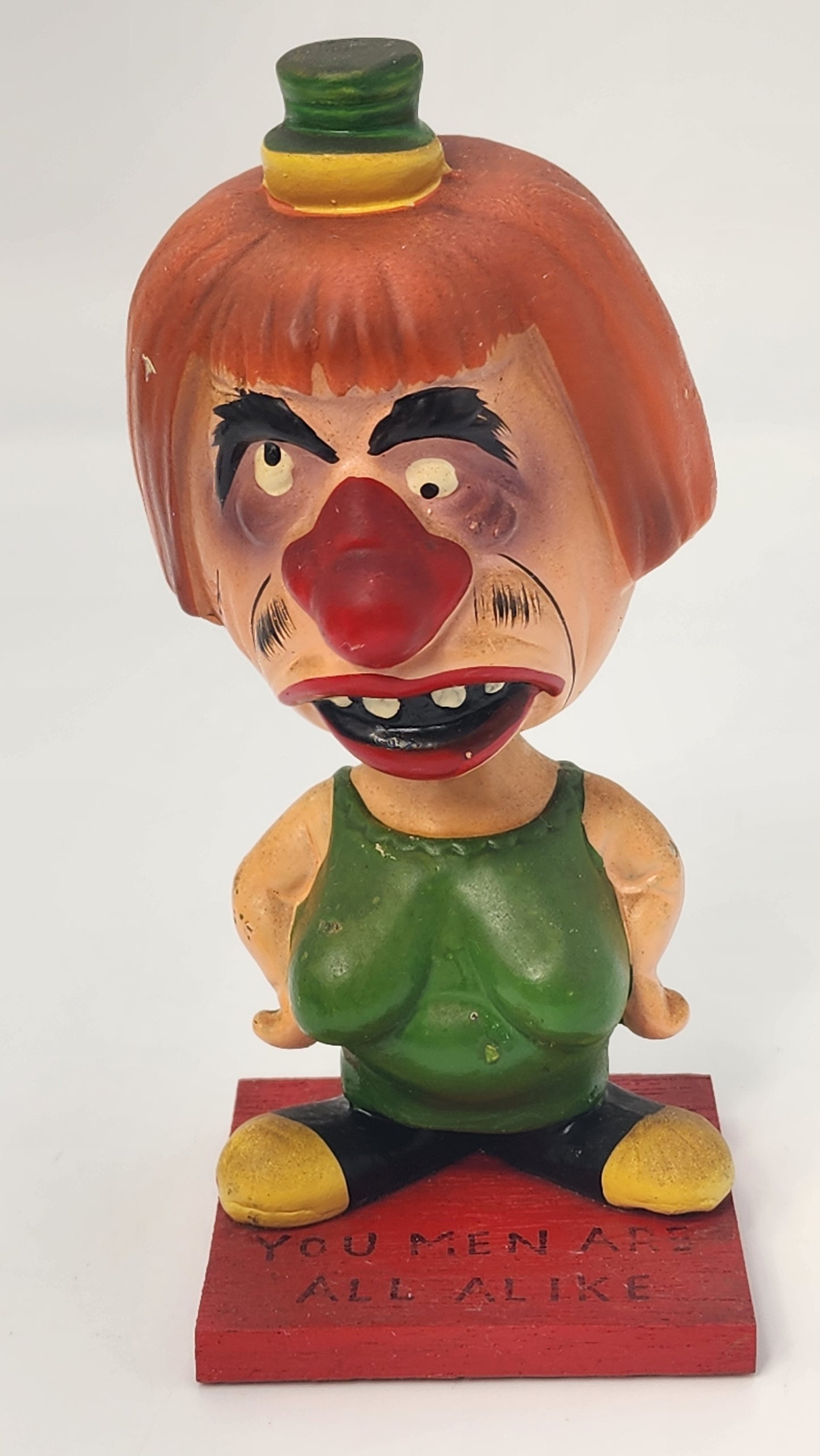 Rumpus Room bobblehead front view showing comical clown character and YOU MEN ARE ALL ALIKE base