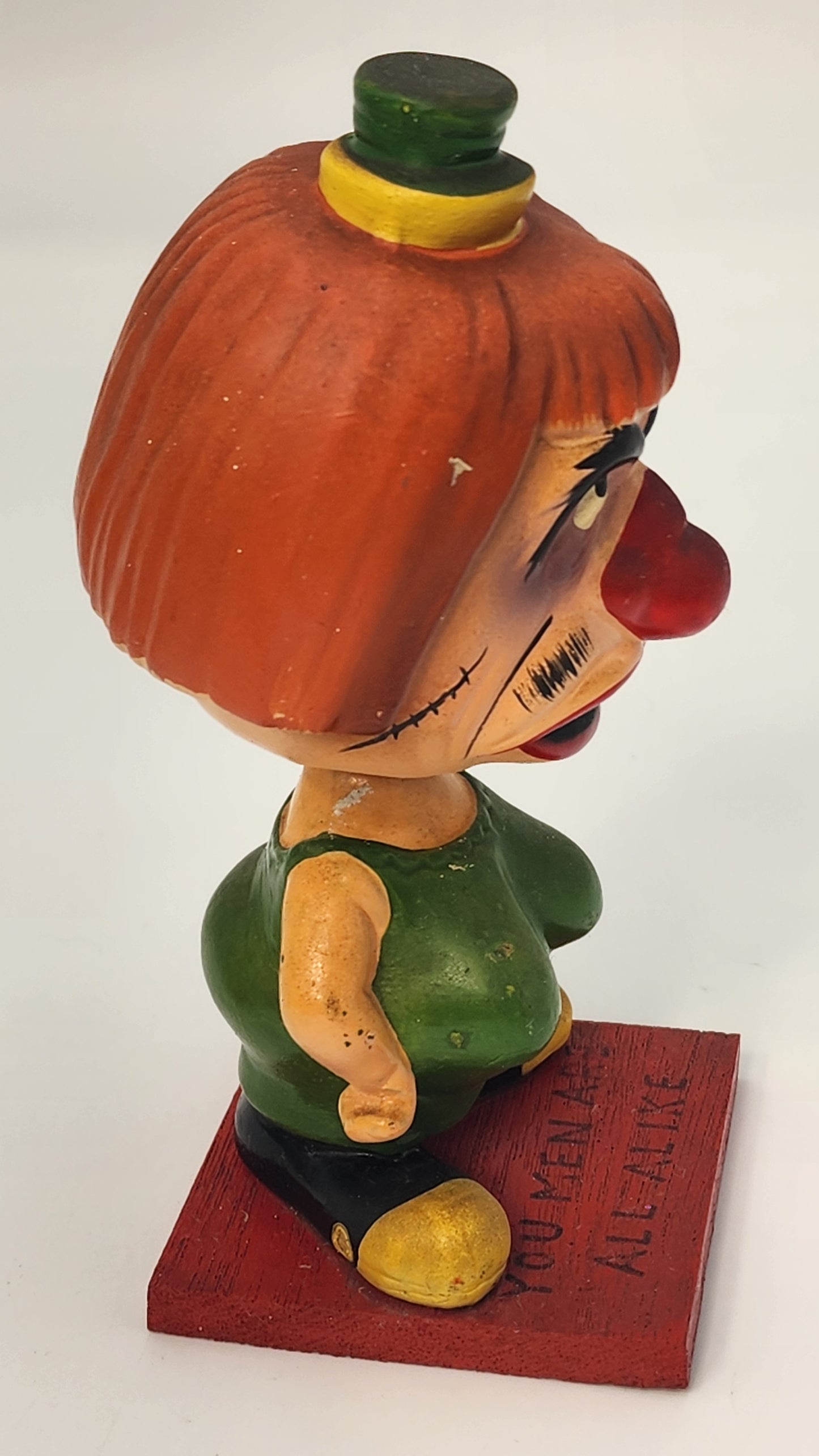 Rumpus Room bobblehead rear view showing red hair and green top hat