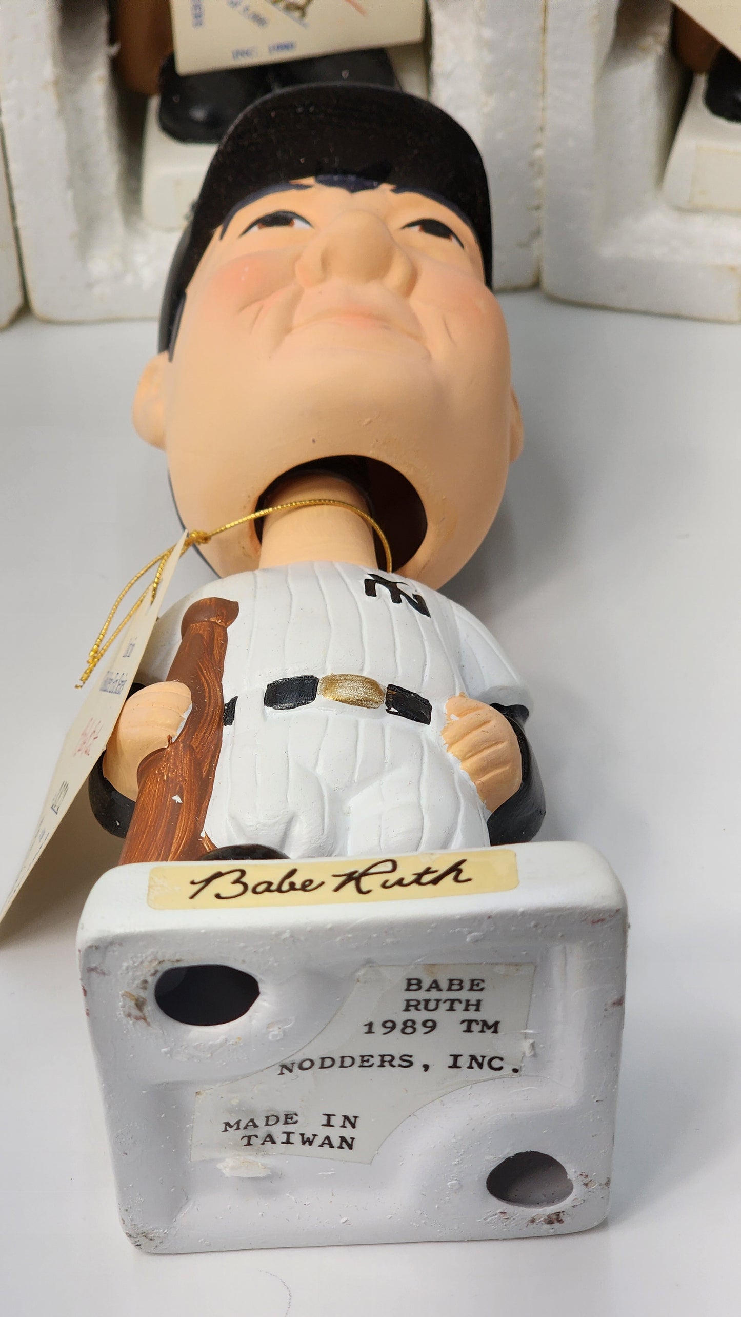 Shoeless Joe Jackson bobblehead side view showing base and hang tag detail
