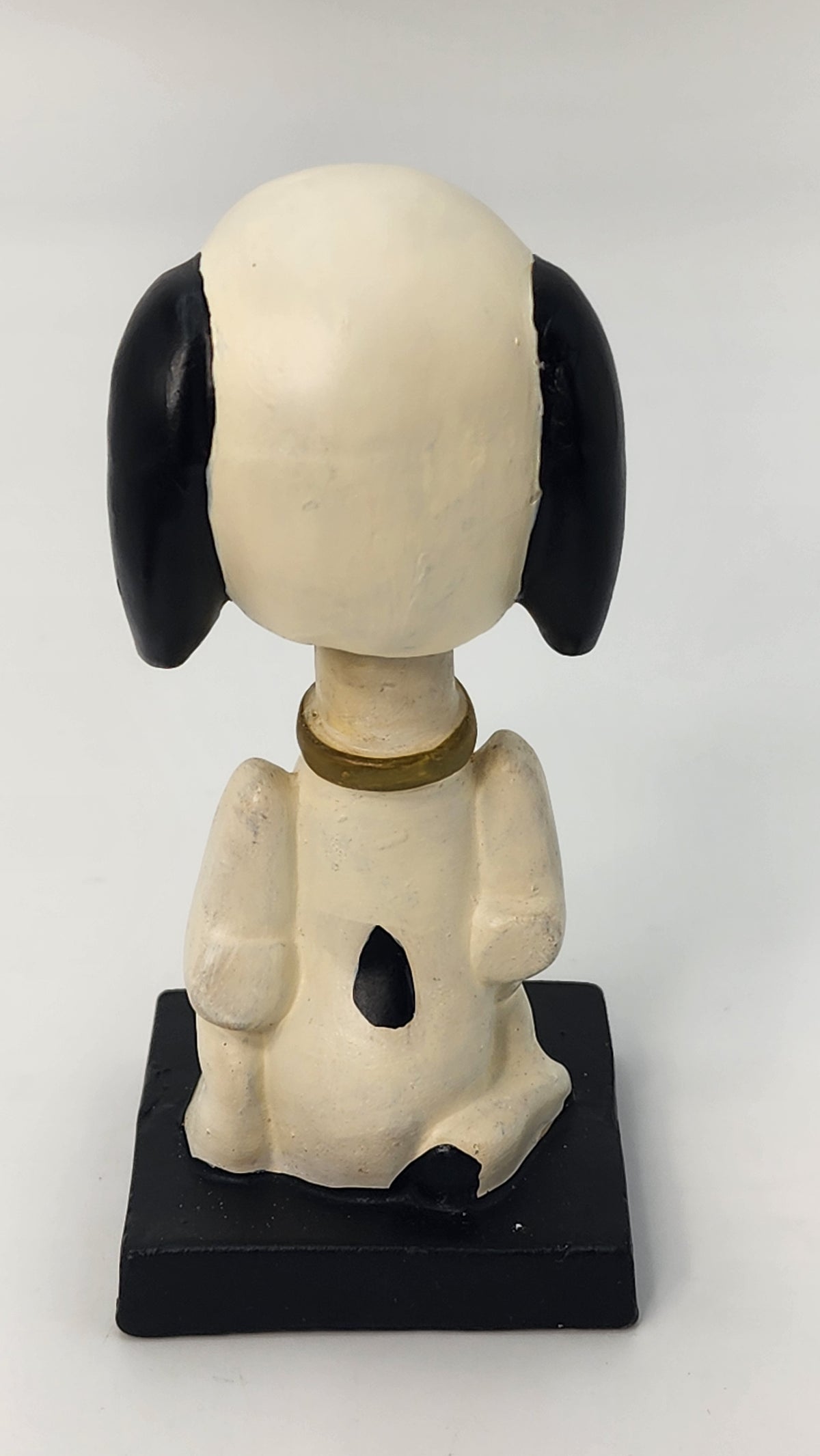 Side view of Snoopy bobblehead