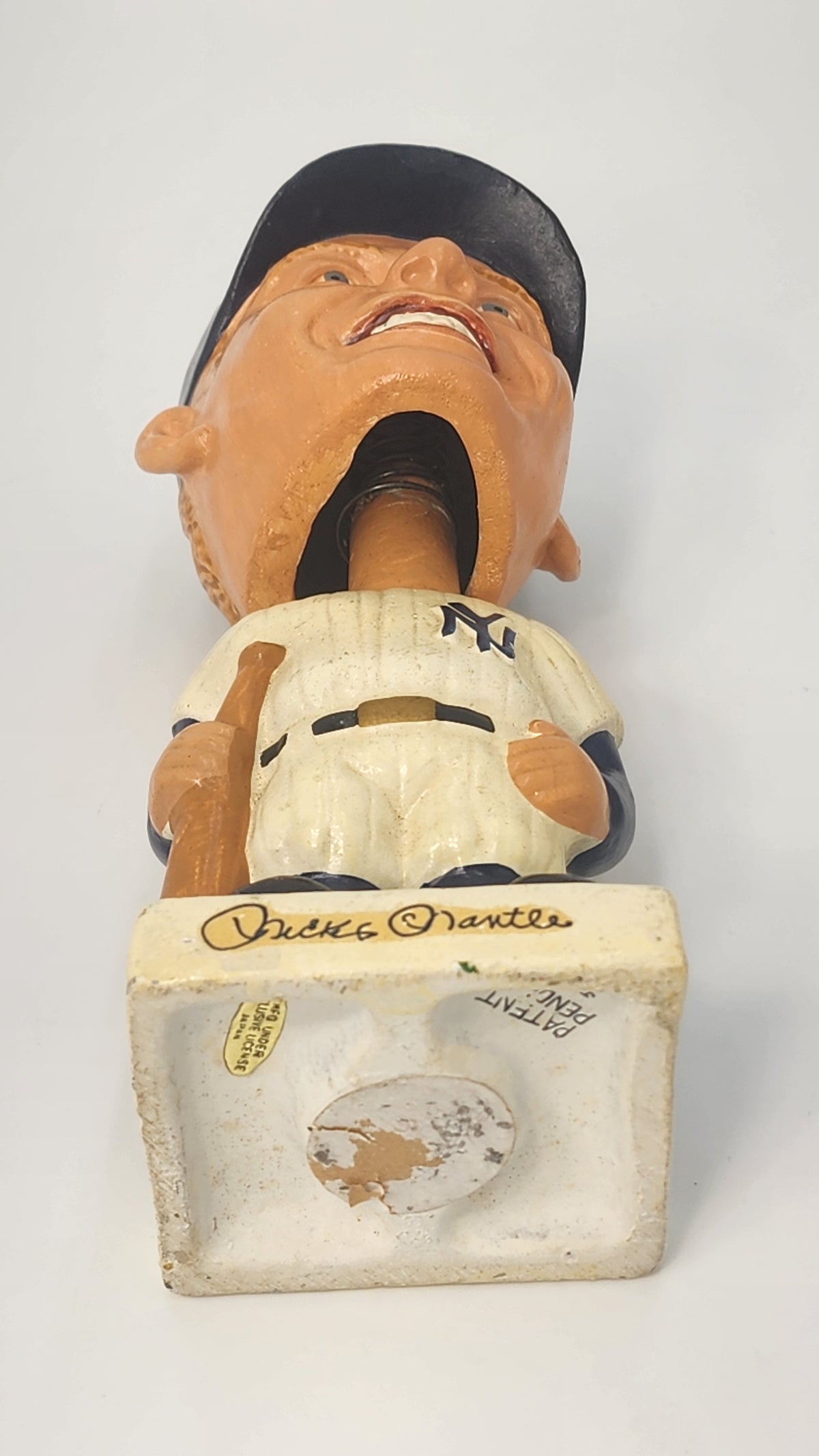 Close-up inside bobblehead head showing surface condition