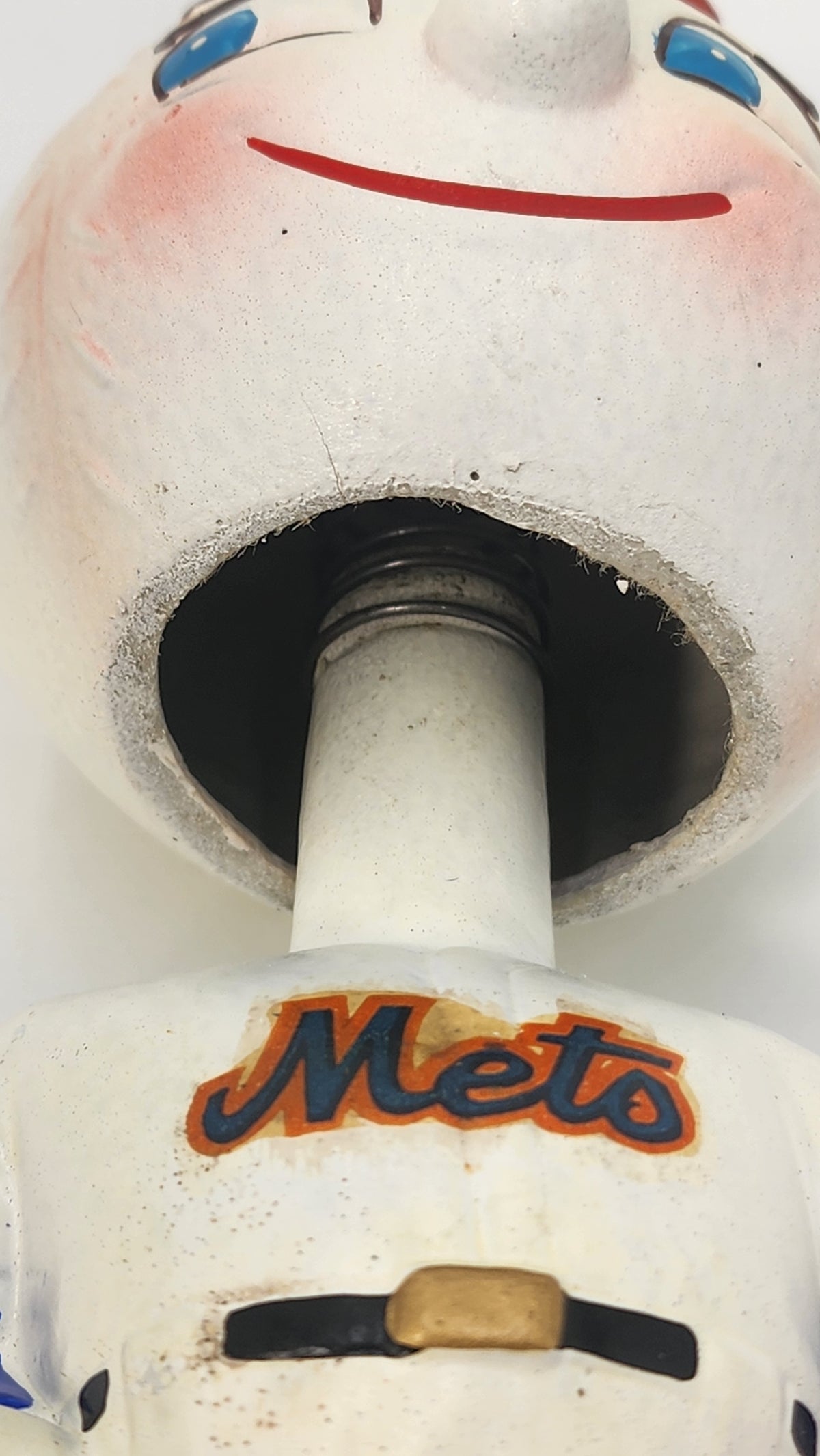 Close-up of Mr. Met bobblehead neck opening