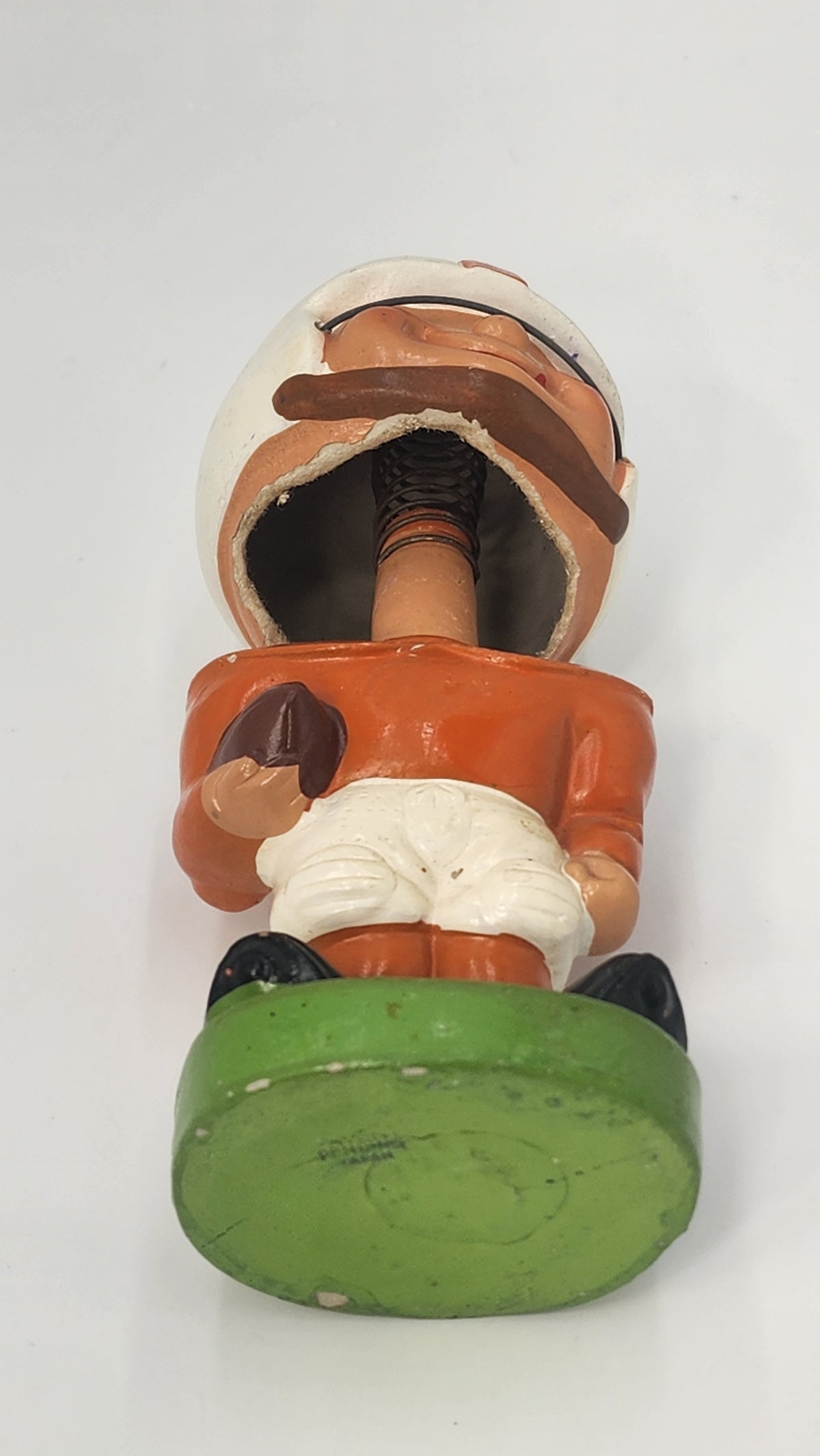 Underside of football player green base