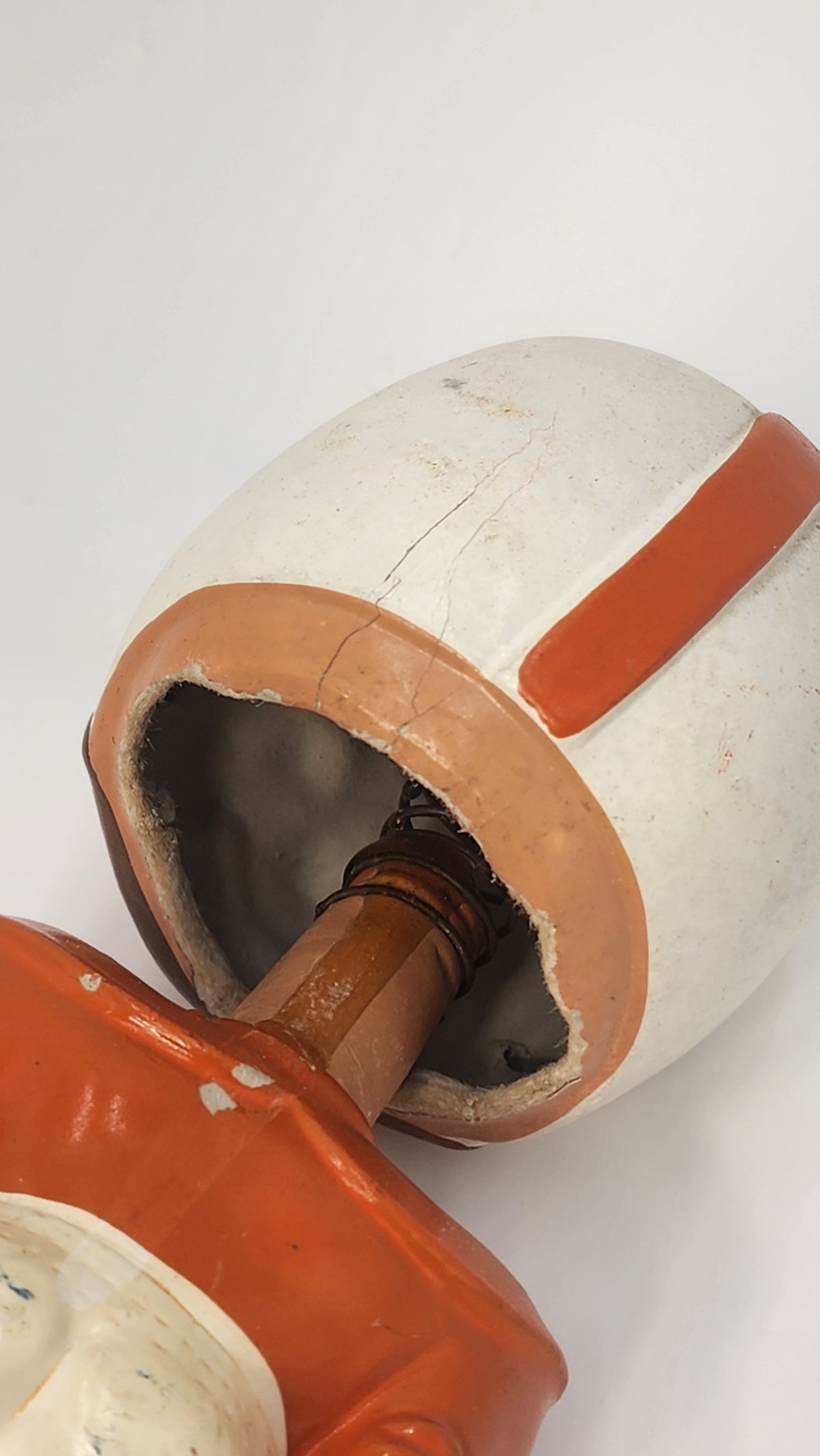 Side view of generic football player holding a football