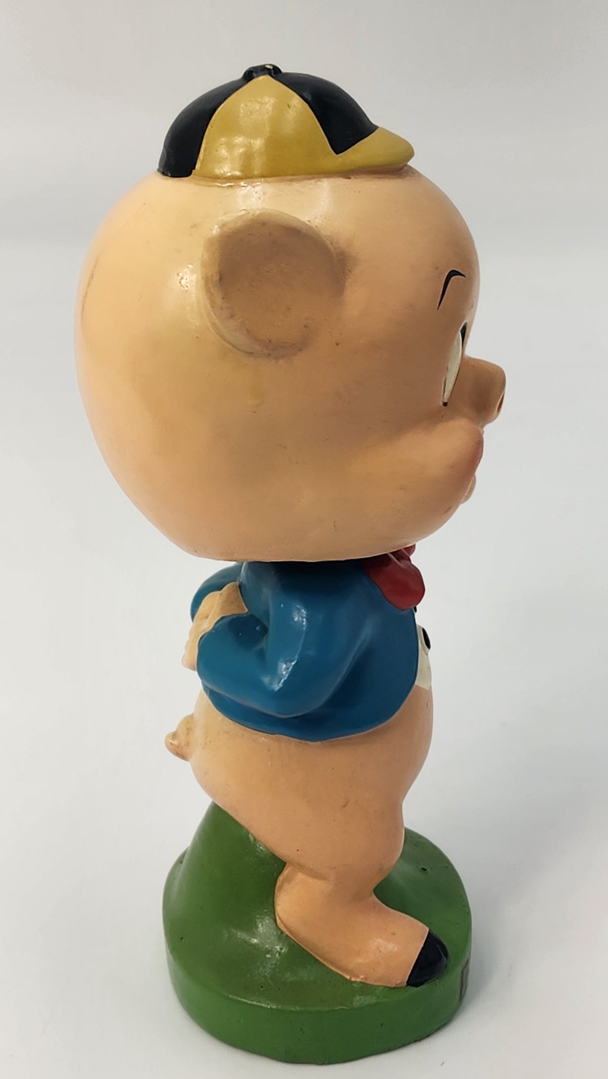 Side view of Porky Pig bobblehead