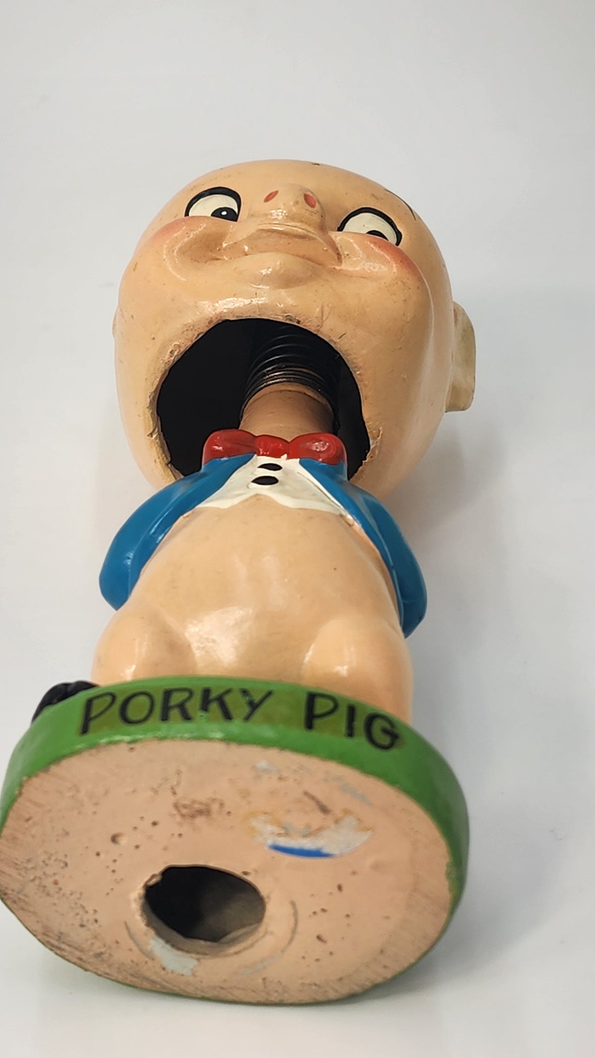 Back of Porky Pig bobblehead