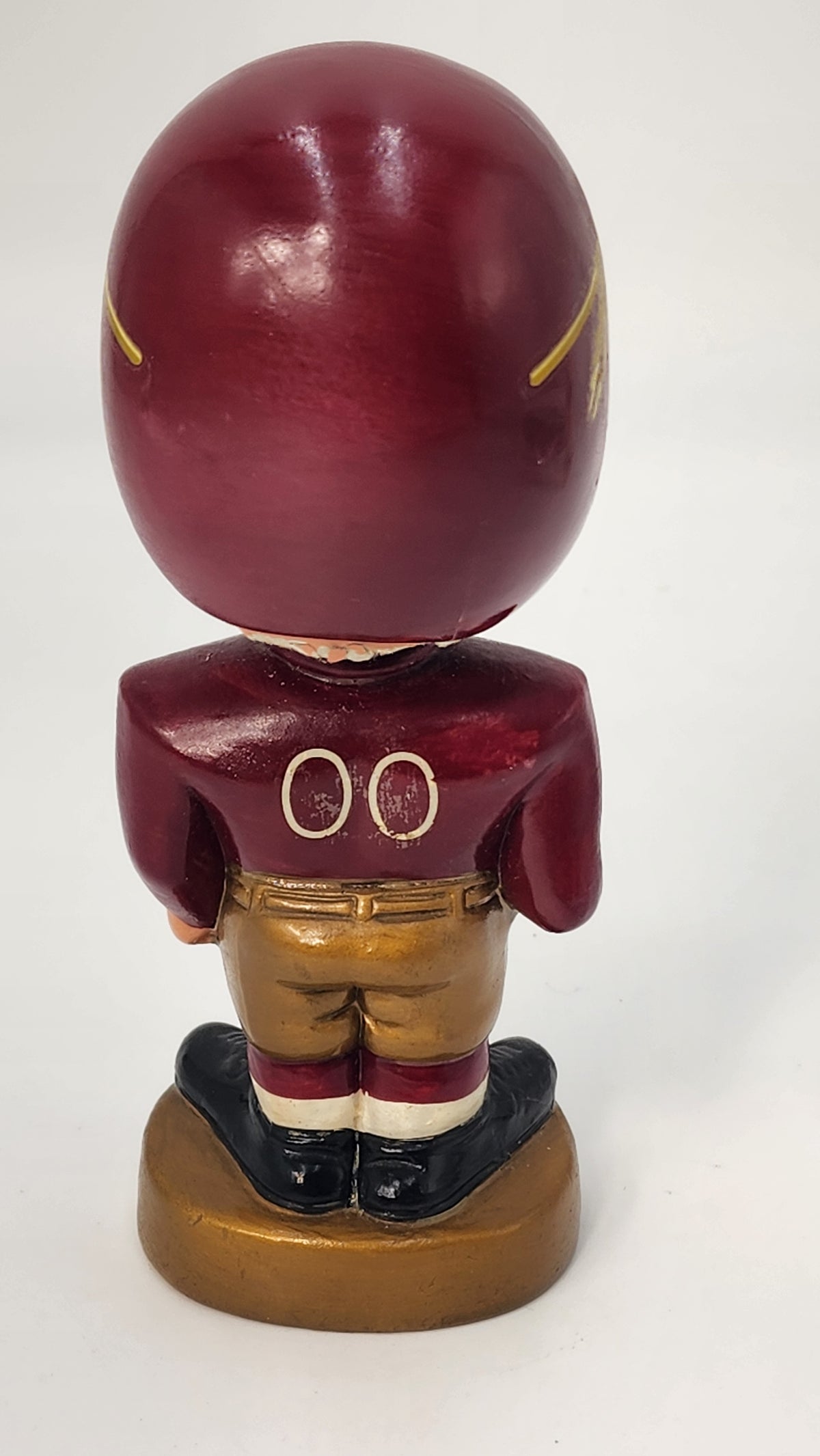 Close-up of Washington bobblehead head and spring