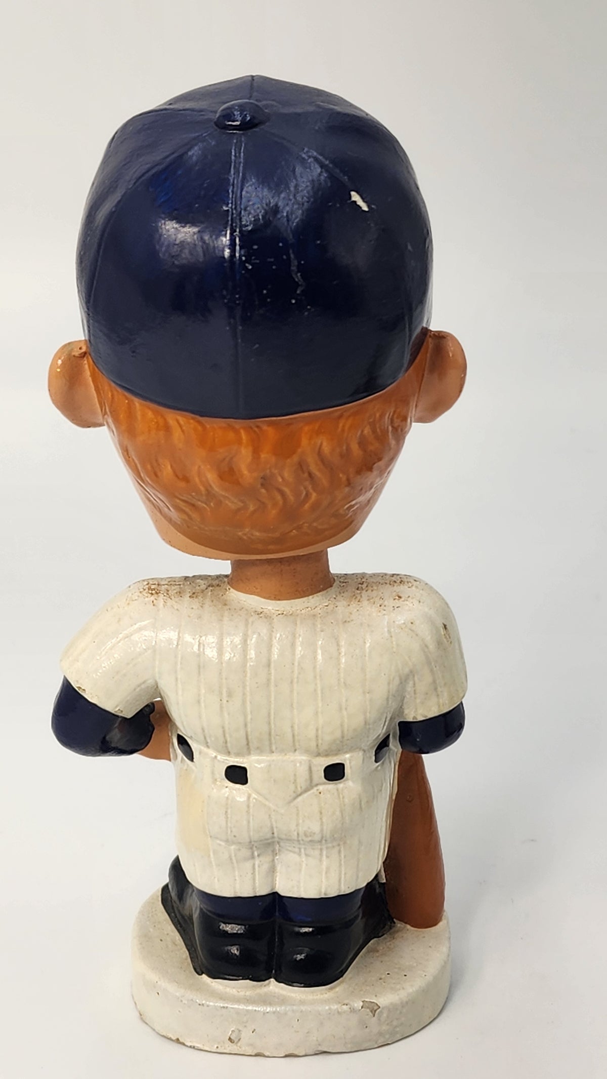Side view of Mickey Mantle bobblehead with bat